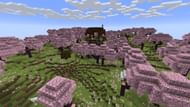 The cherry grove biomes in this Minecraft seed should be great starting positions, the pillagers sure think so (Image via Mojang)